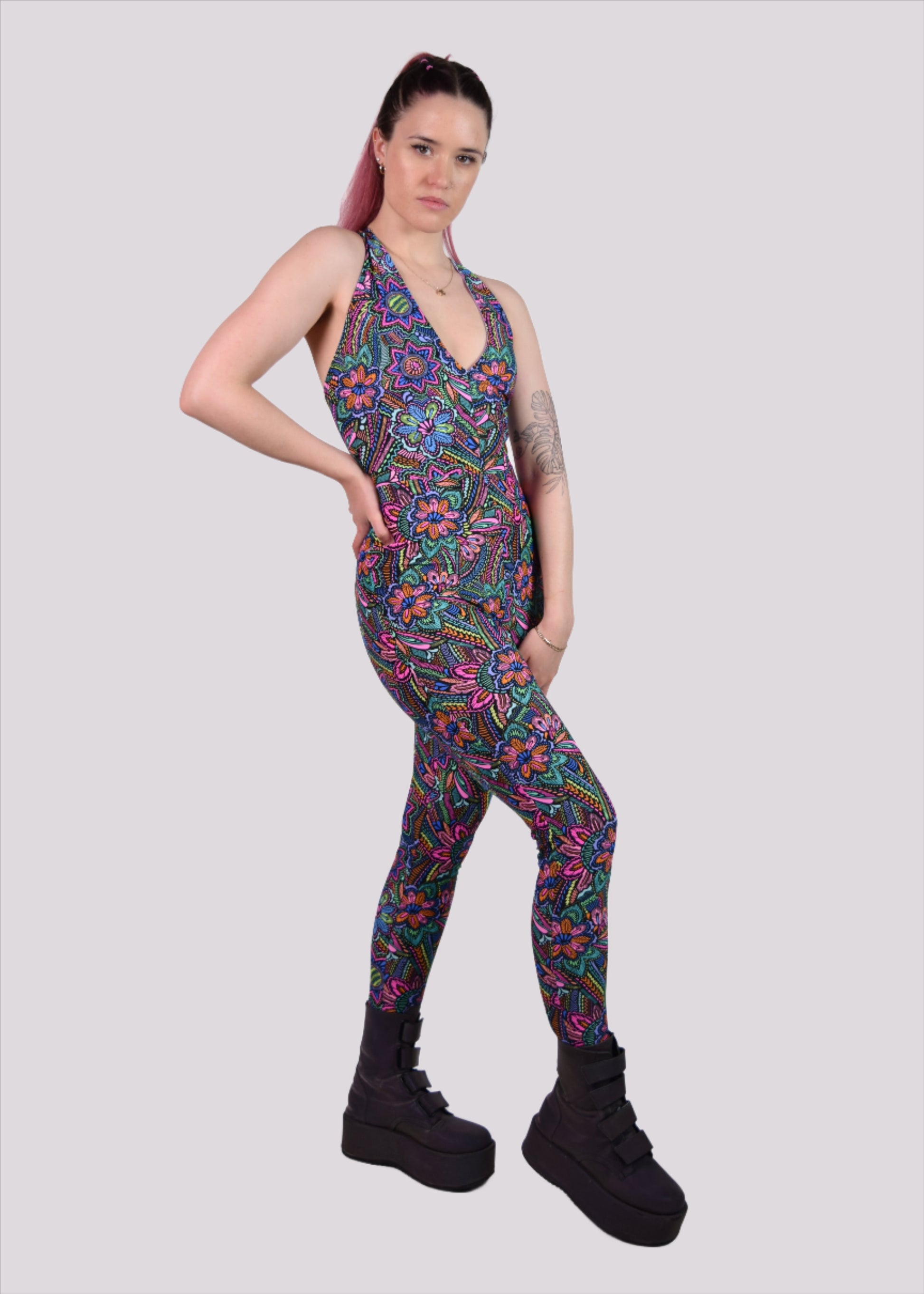 Womens music fesival fashion - Festival-outfit-rave-outfit - handmade-in-Brooklyn-New York City-custom made-waste conscious– retro style – hippie fashion –rave bralette top – festival jumpsuit - sleevless– retro style – supportive x back – adjustable straps - floral print - front view 