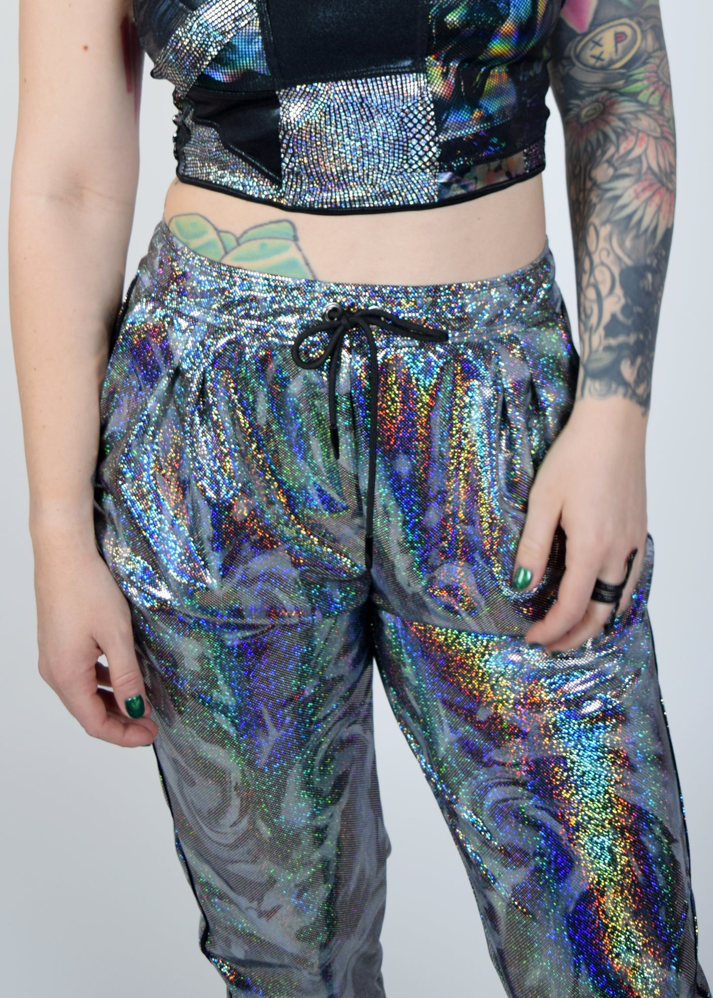 Unisex-music fesival fashion - Festival-outfit-rave-outfit - handmade-in-Brooklyn-New York City-custom made-waste conscious – psychedelic fashion – retro style – hippie fashion –handmade - Roadie Jogger– festival pants – rave pants - silver sparkle - mercury sparkle - up close view - waist line with drawstring