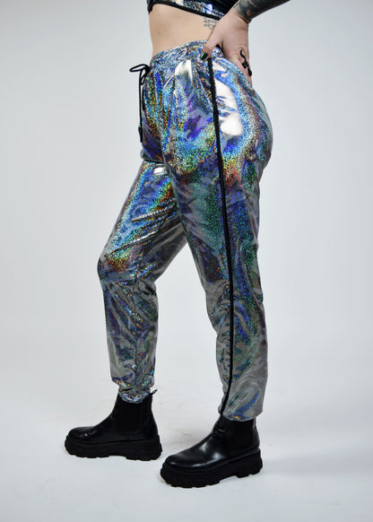 Unisex-music fesival fashion - Festival-outfit-rave-outfit - handmade-in-Brooklyn-New York City-custom made-waste conscious – psychedelic fashion – retro style – hippie fashion –handmade - Roadie Jogger– festival pants – rave pants - silver sparkle - mercury sparkle - side view