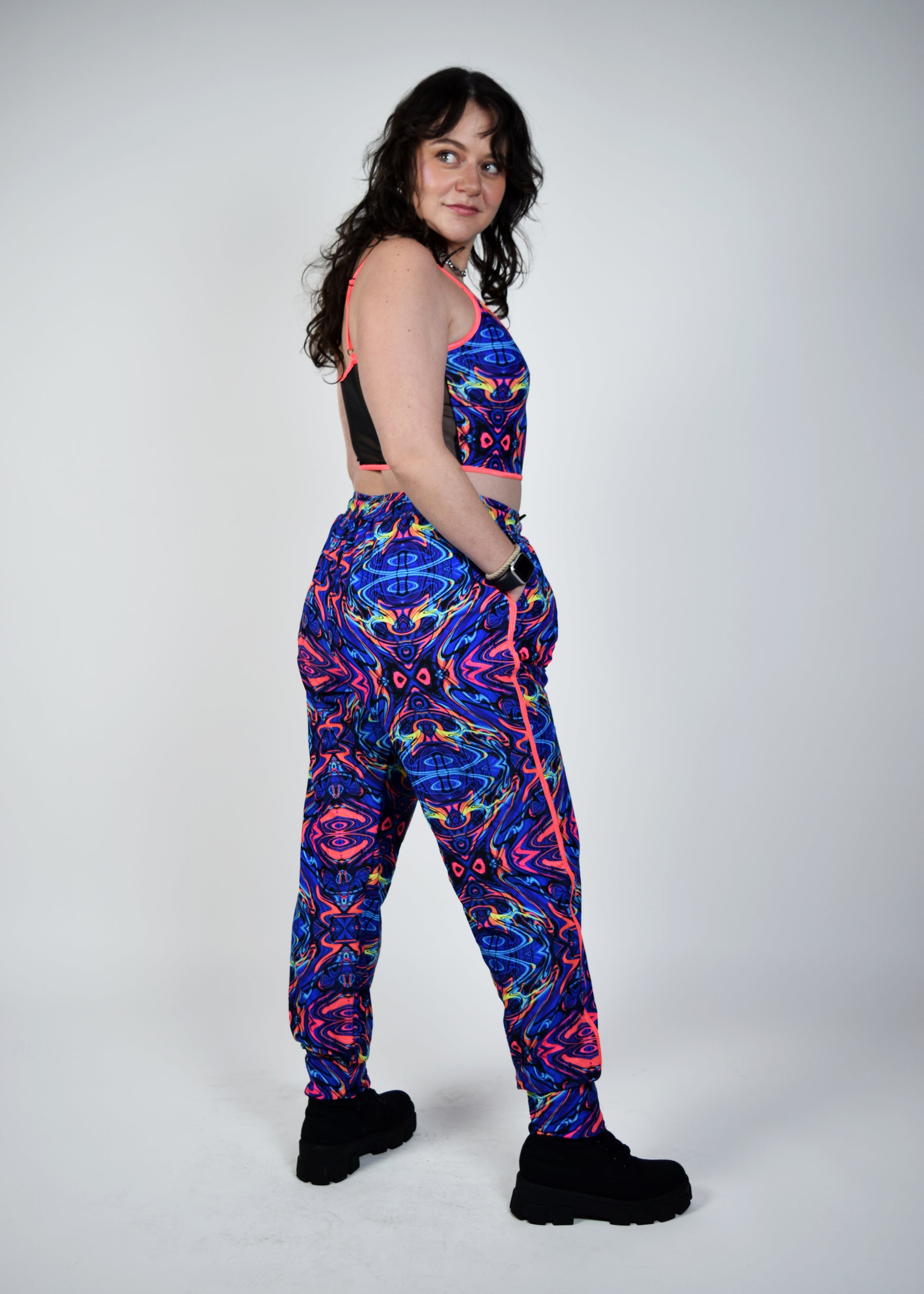 Unisex-music fesival fashion - Festival-outfit-rave-outfit - handmade-in-Brooklyn-New York City-custom made-waste conscious – psychedelic fashion – retro style – hippie fashion –handmade - Roadie Jogger– festival pants – rave pants - nocturnal animal - on model side view