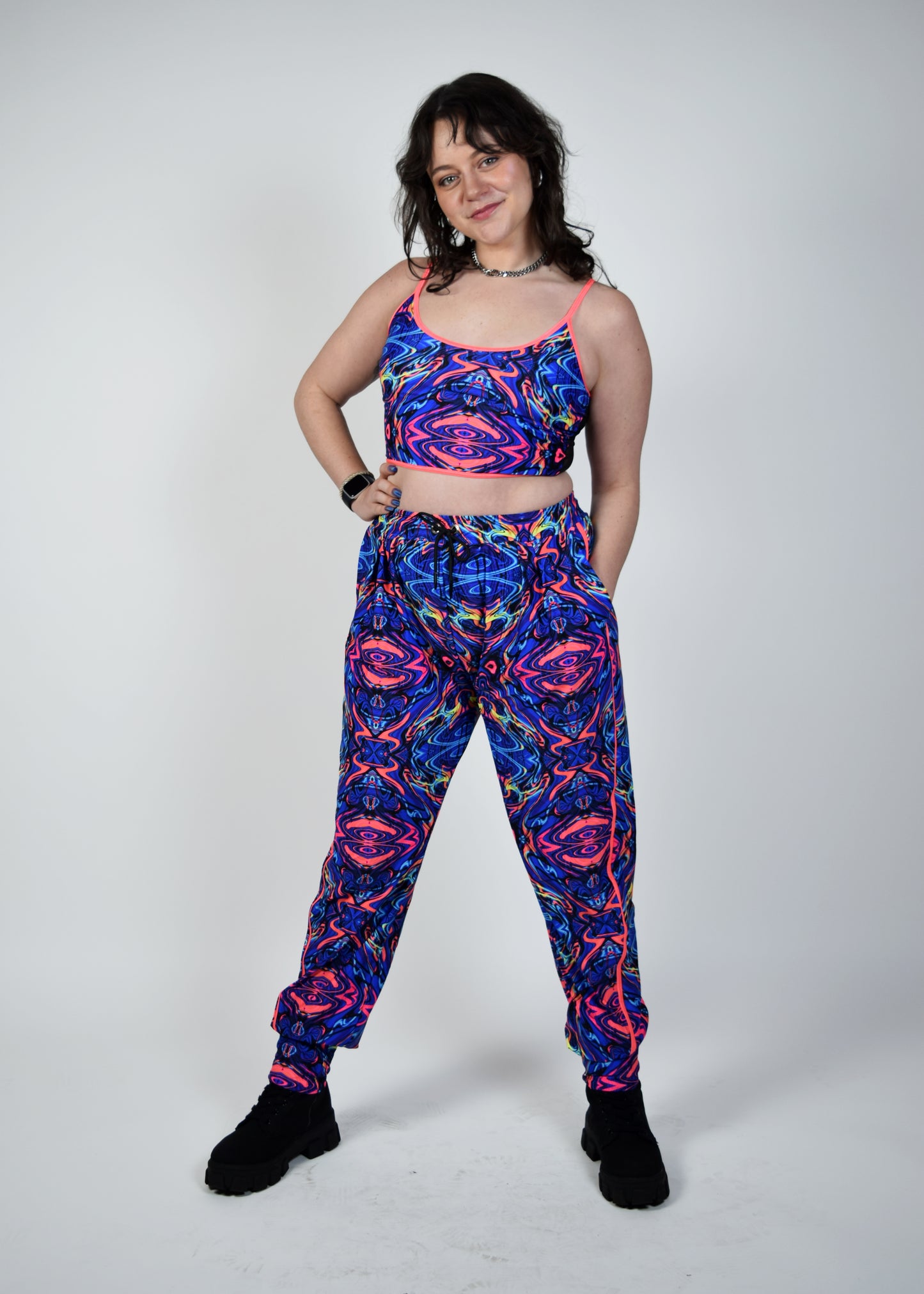 Unisex-music fesival fashion - Festival-outfit-rave-outfit - handmade-in-Brooklyn-New York City-custom made-waste conscious – psychedelic fashion – retro style – hippie fashion –handmade - Roadie Jogger– festival pants – rave pants - nocturnal animal - front view on model