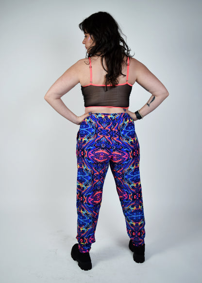 Unisex-music fesival fashion - Festival-outfit-rave-outfit - handmade-in-Brooklyn-New York City-custom made-waste conscious – psychedelic fashion – retro style – hippie fashion –handmade - Roadie Jogger– festival pants – rave pants - nocturnal animal - back view