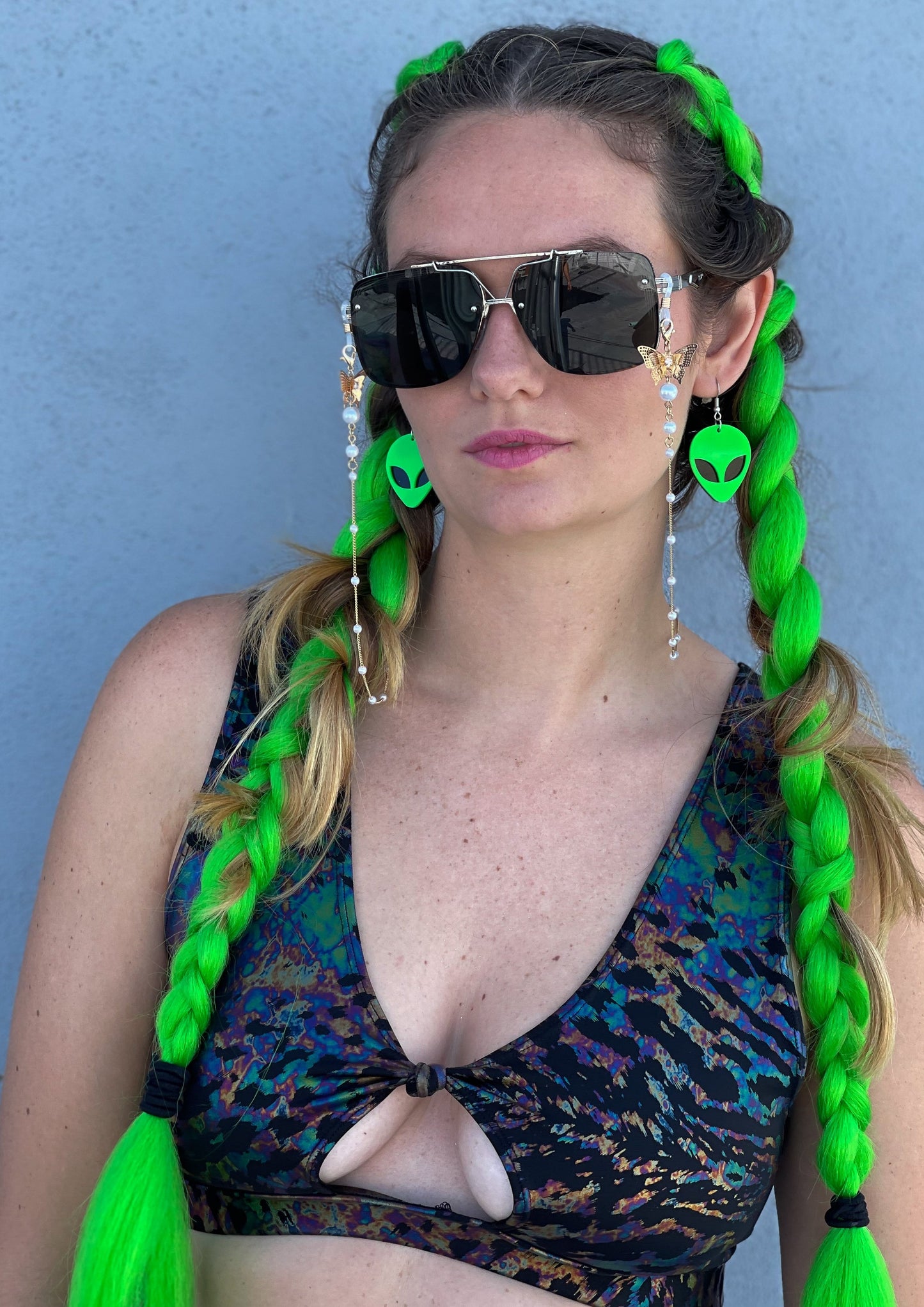 Radioactive print -  Womens music fesival fashion - Festival-outfit-rave-outfit - handmade-in-Brooklyn-New York City-custom made-waste conscious– retro style – hippie fashion – Knot Front crop tank – front knot – rave bralette top – festival top - front view